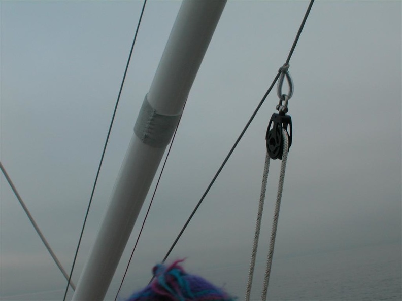 The downhaul block attached to the bridle (now its at the end of the pole)