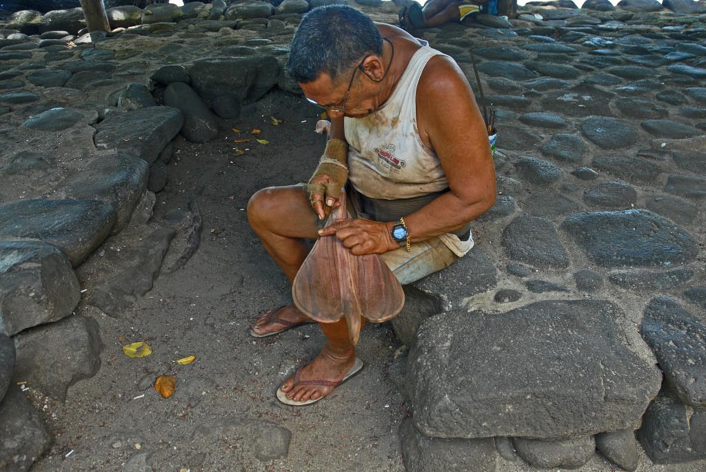 The carver working on another piece